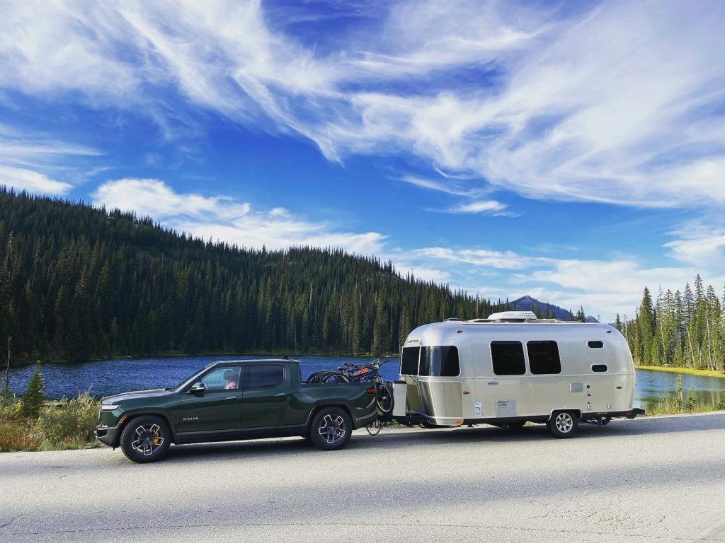 Rivian R1T towing an Airstream over the Kootenay Pass